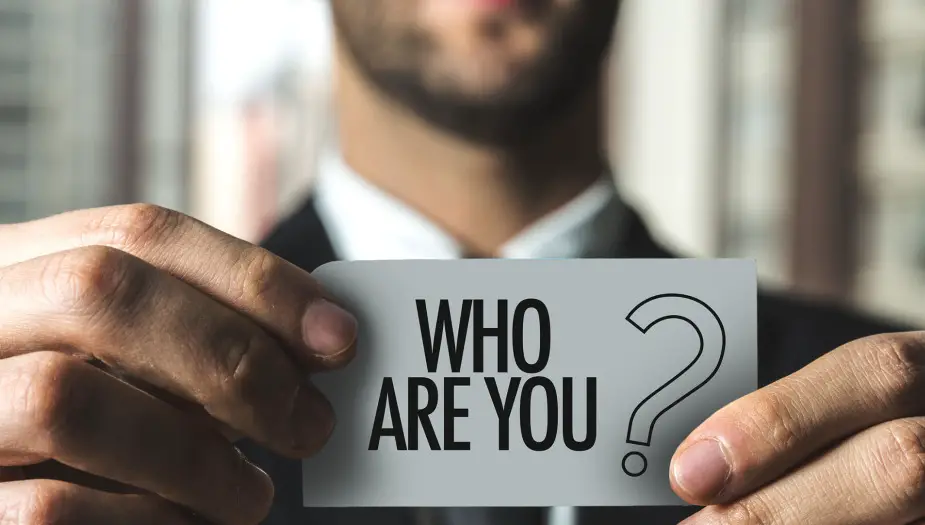 Man holding sign about true colors personality test